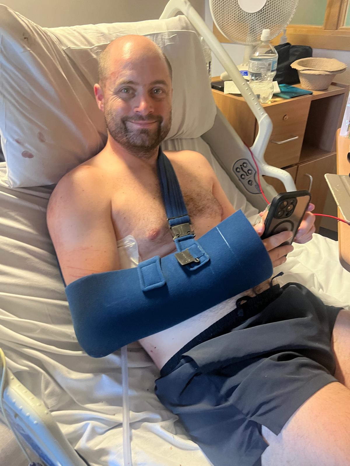 In hospital wearing a sling a few days after the chest drain was inserted